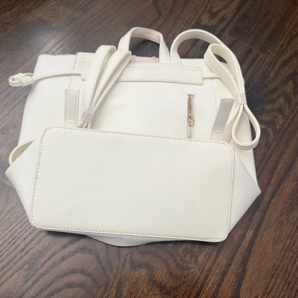 Chic Cream Backpack with Tassel Accent